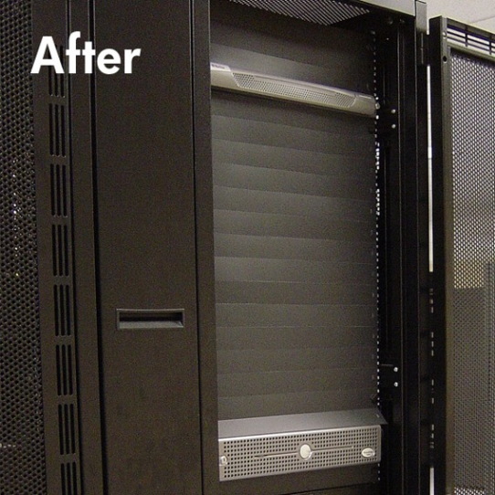 A photo of a server stack with blanking panels.