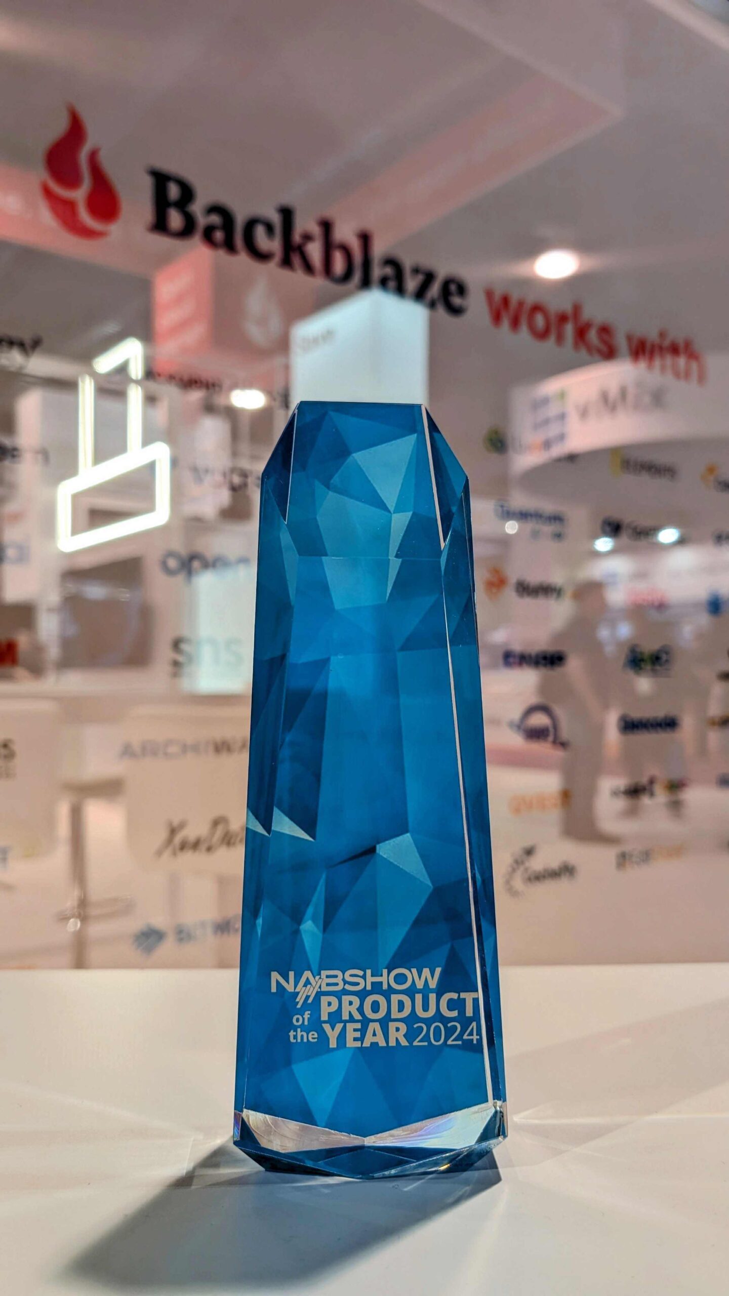 A photograph of the 2024 Product of the Year trophy. Backblaze won this award for their new feature, Event Notifications.
